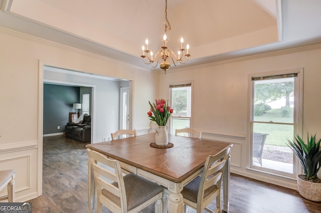 2005 Ashton Pointe Dr, Dacula, GA 30019 - dining room with a chandelier, wood finished floors, wainscoting, ornamental molding, and a raised ceiling