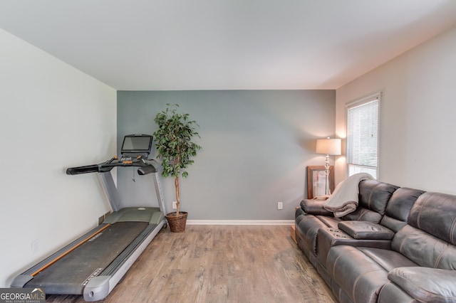 2005 Ashton Pointe Dr, Dacula, GA 30019 - living area featuring wood finished floors and baseboards
