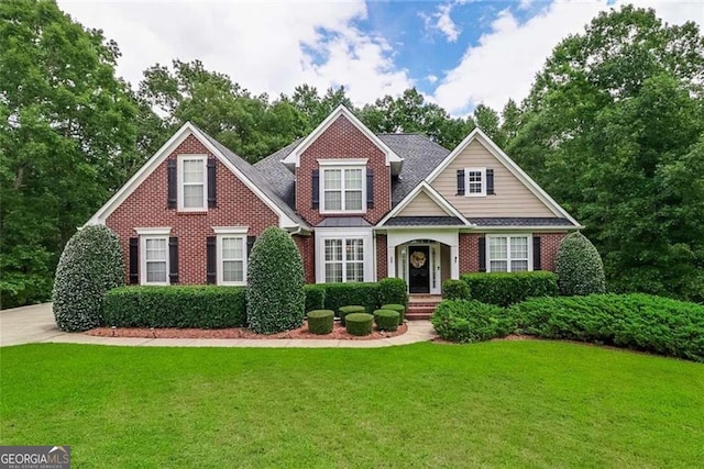 2995 Barimore Pl, Dacula, GA 30019 - view of front of home featuring a front lawn and brick siding
