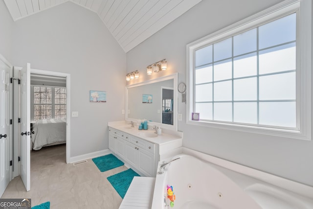 2995 Barimore Pl, Dacula, GA 30019 - ensuite bathroom with vaulted ceiling, a whirlpool tub, double vanity, and wooden ceiling