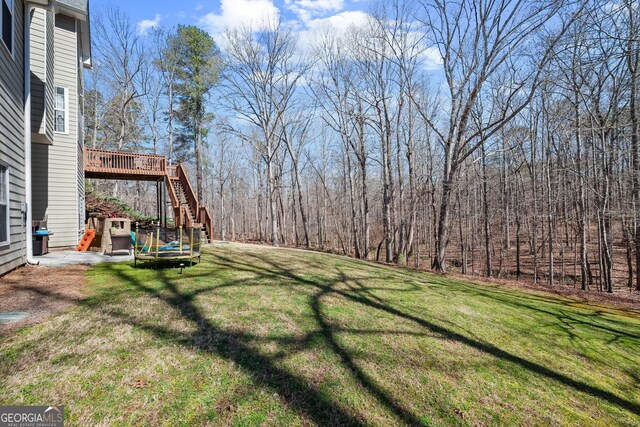 2995 Barimore Pl, Dacula, GA 30019 - view of grassy yard with stairs and a wooden deck
