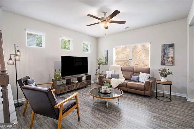 152 Malbone St SW, Cartersville, GA 30120 - living room with baseboards, a ceiling fan, and wood finished floors