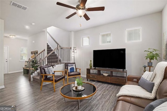 152 Malbone St SW, Cartersville, GA 30120 - living room featuring wood finished floors, baseboards, ceiling fan, stairs, and healthy amount of natural light