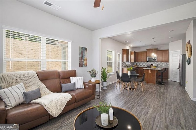 152 Malbone St SW, Cartersville, GA 30120 - living room with baseboards, a ceiling fan, and dark wood finished floors