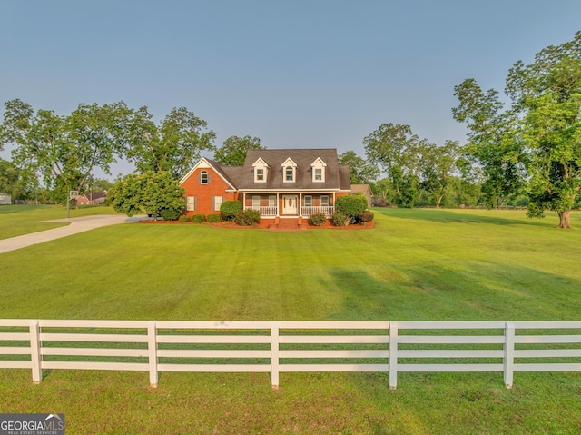 2717 Old Eastman Rd, Cadwell, GA 31009 - cape cod house featuring covered porch