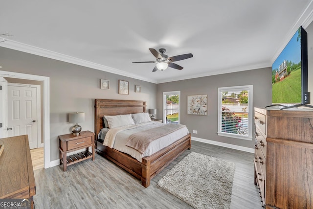 2717 Old Eastman Rd, Cadwell, GA 31009 - bedroom with baseboards, light wood-style floors, ornamental molding, and ceiling fan
