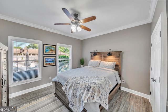 2717 Old Eastman Rd, Cadwell, GA 31009 - bedroom featuring baseboards, light wood-type flooring, crown molding, and a ceiling fan