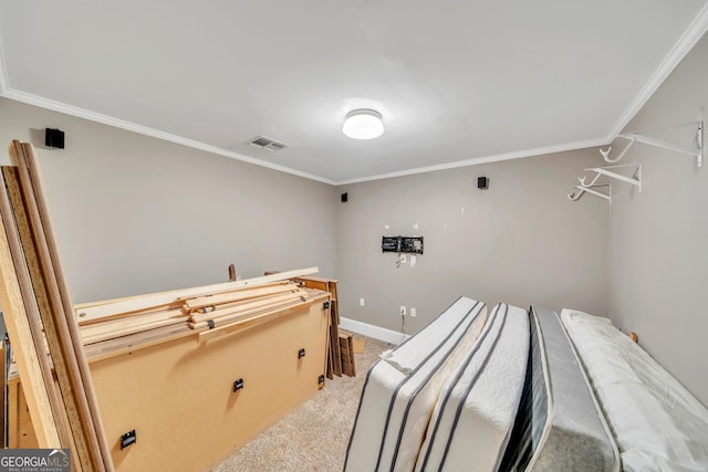2717 Old Eastman Rd, Cadwell, GA 31009 - bedroom with ornamental molding, light carpet, and baseboards