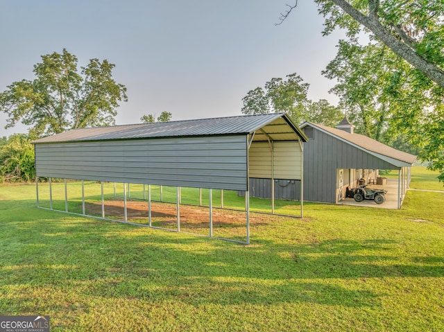 2717 Old Eastman Rd, Cadwell, GA 31009 - view of outbuilding with a carport