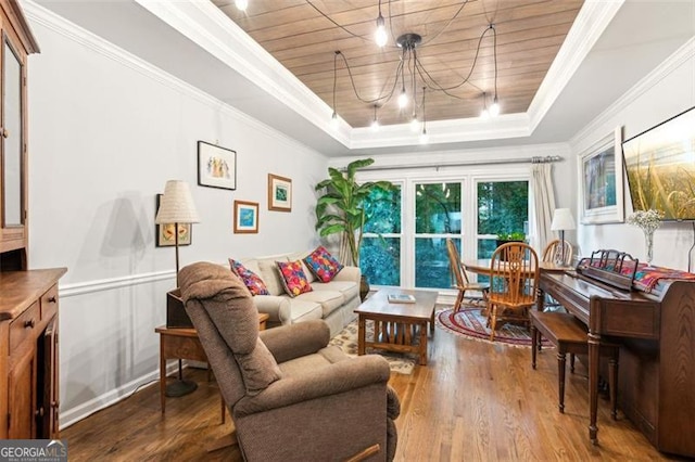 2220 Cape Courage Way, Suwanee, GA 30024 - living room featuring a tray ceiling, wooden ceiling, wood finished floors, and ornamental molding