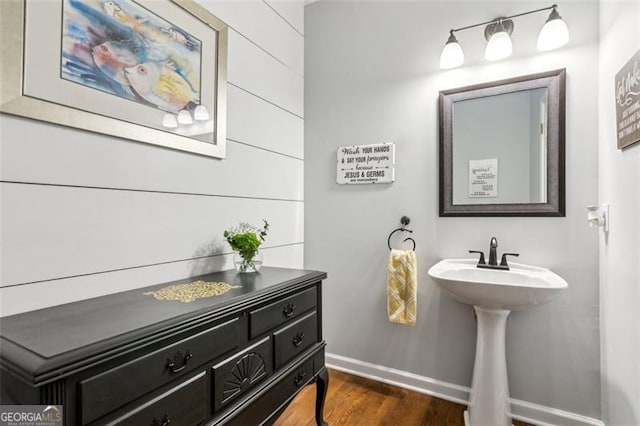 2220 Cape Courage Way, Suwanee, GA 30024 - bathroom featuring baseboards and wood finished floors