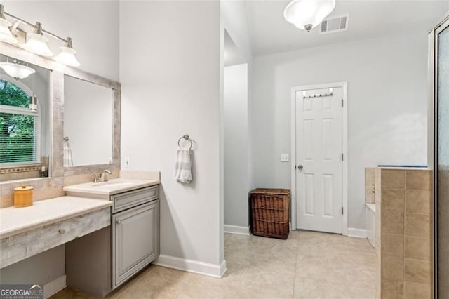 2220 Cape Courage Way, Suwanee, GA 30024 - full bathroom with vanity, a garden tub, tile patterned floors, and a shower with shower door