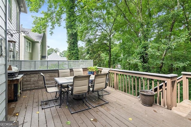 2220 Cape Courage Way, Suwanee, GA 30024 - wooden terrace featuring outdoor dining area