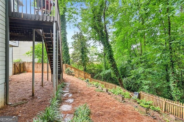 2220 Cape Courage Way, Suwanee, GA 30024 - fenced backyard with stairway