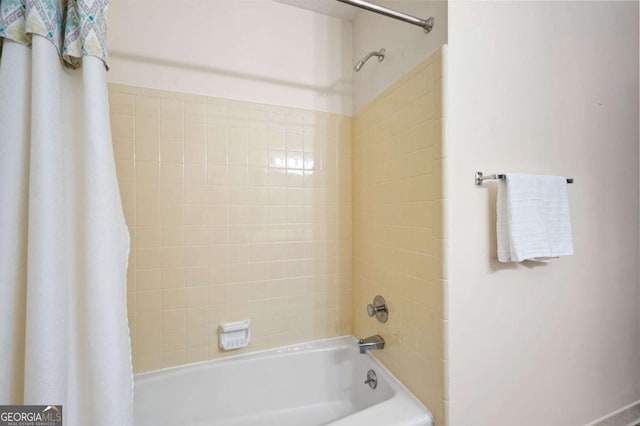272 Creek Ct SW, Marietta, GA 30064 - bathroom featuring shower / bathtub combination with curtain