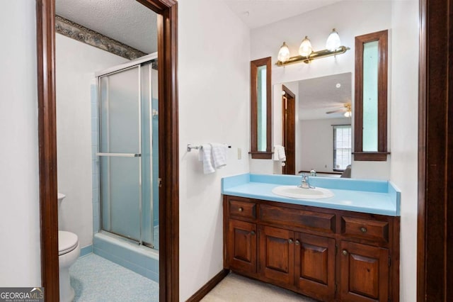 272 Creek Ct SW, Marietta, GA 30064 - full bath featuring toilet, a stall shower, vanity, and a ceiling fan