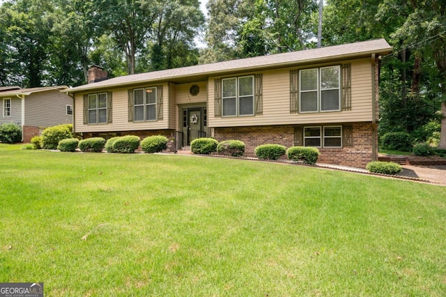 272 Creek Ct SW, Marietta, GA 30064 - raised ranch with a front yard, brick siding, and a chimney