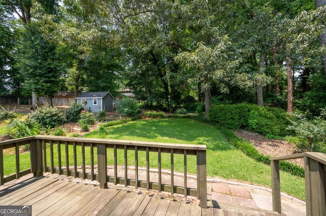 272 Creek Ct SW, Marietta, GA 30064 - wooden deck featuring a yard and view of wooded area