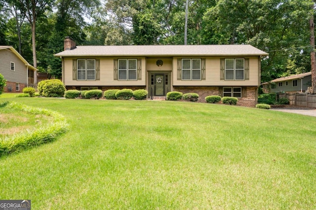 272 Creek Ct SW, Marietta, GA 30064 - raised ranch featuring a chimney and brick siding