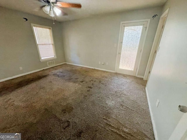 43 Oak Landing Cir, Douglasville, GA 30134 - carpeted empty room featuring a ceiling fan and baseboards