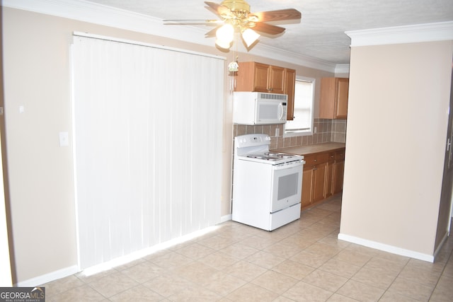 3400 Scott Dr, Austell, GA 30106 - kitchen with white appliances, backsplash, a ceiling fan, crown molding, and light countertops