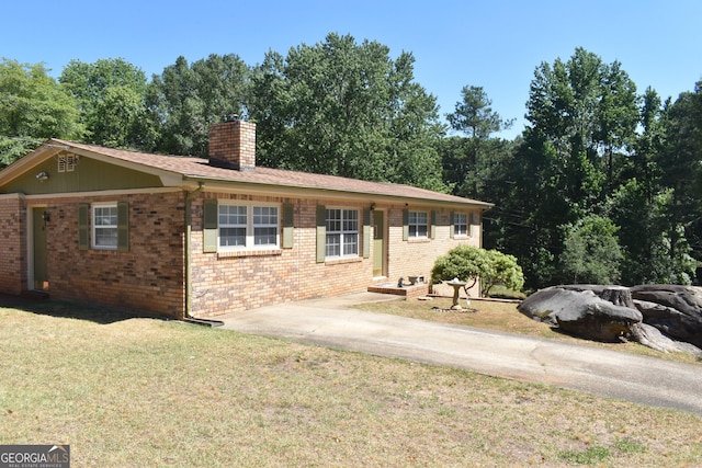 3400 Scott Dr, Austell, GA 30106 - single story home featuring a chimney, a front lawn, and brick siding