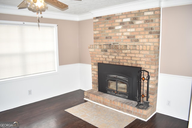 3400 Scott Dr, Austell, GA 30106 - detailed view of a ceiling fan, wood finished floors, a wainscoted wall, ornamental molding, and a fireplace