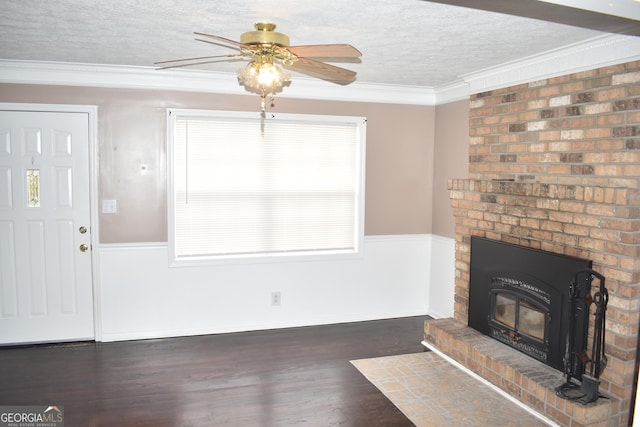 3400 Scott Dr, Austell, GA 30106 - unfurnished living room featuring a ceiling fan, a textured ceiling, wood finished floors, and crown molding
