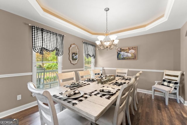 149 Highland Rd S, Dahlonega, GA 30533 - dining area with a raised ceiling, a chandelier, wood finished floors, baseboards, and crown molding