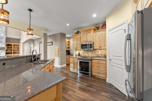 149 Highland Rd S, Dahlonega, GA 30533 - kitchen with stainless steel appliances, a sink, light brown cabinetry, dark wood-style floors, and recessed lighting
