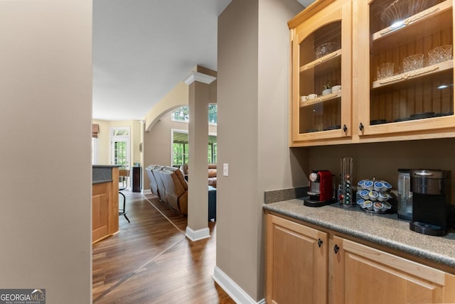 149 Highland Rd S, Dahlonega, GA 30533 - bar with arched walkways, dark wood-style floors, and baseboards