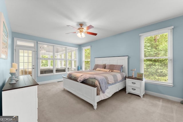 149 Highland Rd S, Dahlonega, GA 30533 - bedroom featuring baseboards, multiple windows, and light carpet