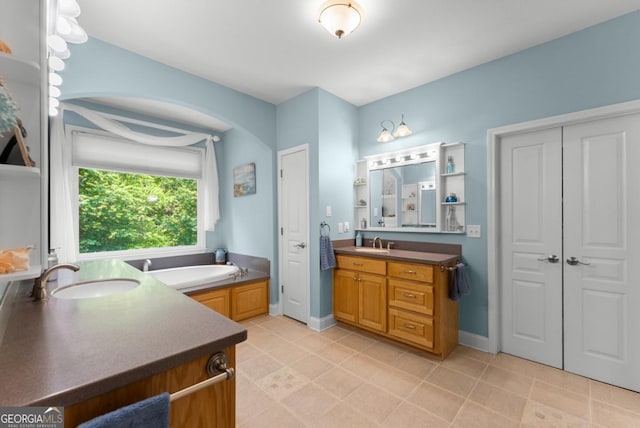 149 Highland Rd S, Dahlonega, GA 30533 - bathroom with vanity, a garden tub, and tile patterned flooring