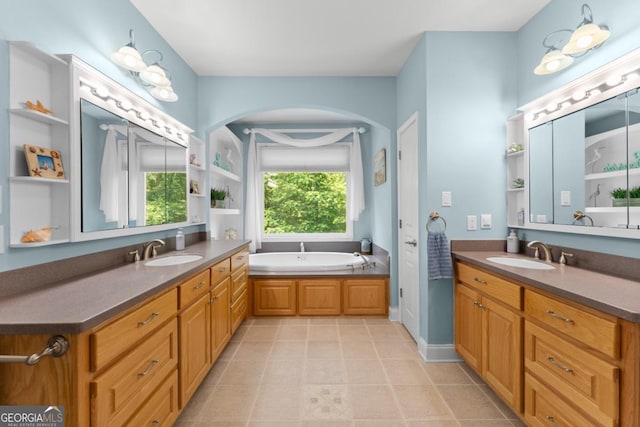 149 Highland Rd S, Dahlonega, GA 30533 - full bath with two vanities, a bath, and tile patterned floors