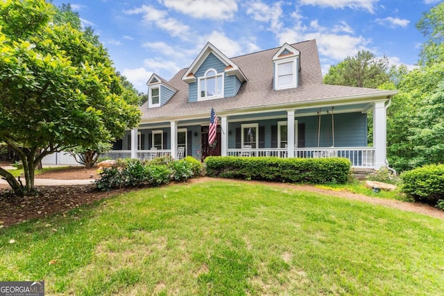 149 Highland Rd S, Dahlonega, GA 30533 - new england style home featuring a porch, a front yard, and a shingled roof
