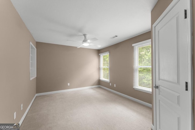 149 Highland Rd S, Dahlonega, GA 30533 - empty room featuring baseboards, light colored carpet, and ceiling fan