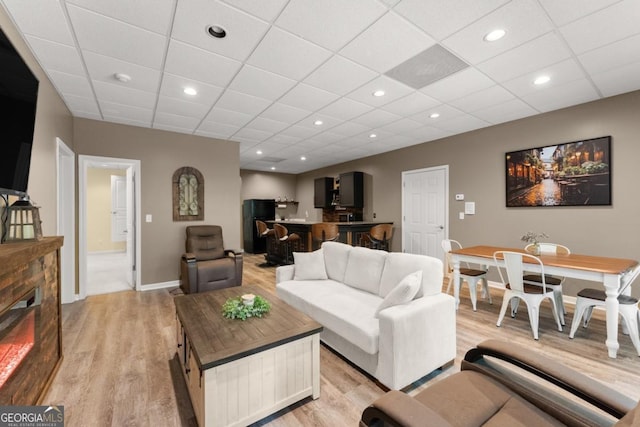 149 Highland Rd S, Dahlonega, GA 30533 - living area featuring light wood-type flooring, baseboards, a drop ceiling, and recessed lighting