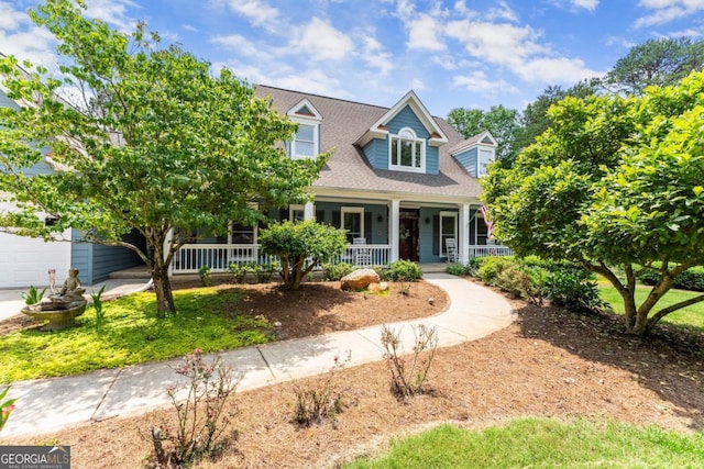149 Highland Rd S, Dahlonega, GA 30533 - cape cod-style house featuring a porch and roof with shingles