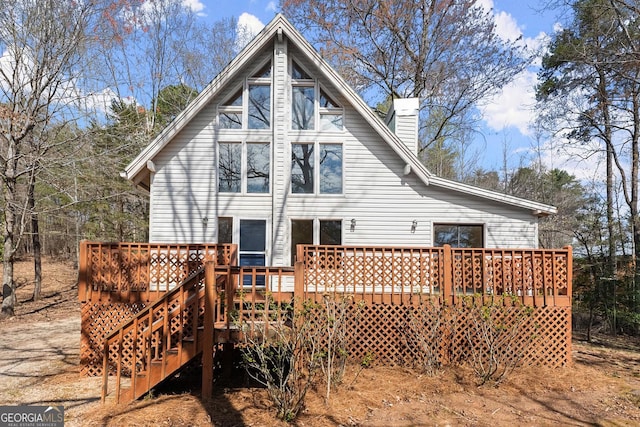 405 Cedar Hollow Rd Unit 2, Cleveland, GA 30528 - rear view of property with a wooden deck and a chimney