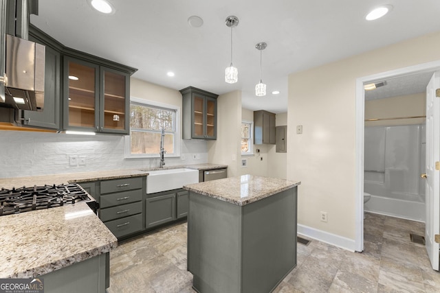 405 Cedar Hollow Rd Unit 2, Cleveland, GA 30528 - kitchen with a sink, backsplash, baseboards, light stone countertops, and dishwasher