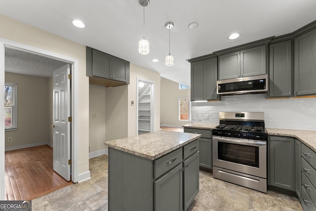 405 Cedar Hollow Rd Unit 2, Cleveland, GA 30528 - kitchen featuring appliances with stainless steel finishes, gray cabinetry, pendant lighting, tasteful backsplash, and recessed lighting