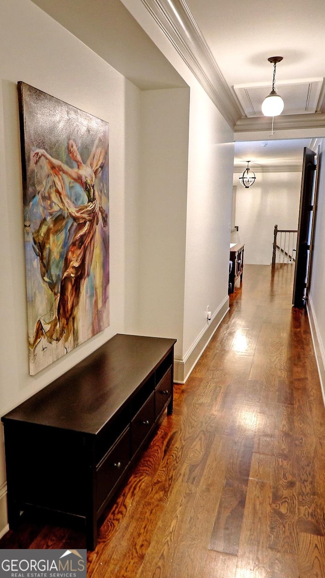 1178 Chambord Way NE, Brookhaven, GA 30319 - corridor featuring dark wood-type flooring, crown molding, baseboards, and attic access