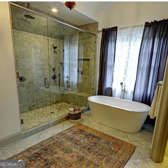 1178 Chambord Way NE, Brookhaven, GA 30319 - bathroom featuring marble finish flooring, a freestanding tub, and a shower stall