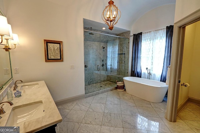 1178 Chambord Way NE, Brookhaven, GA 30319 - full bathroom with a shower stall, a soaking tub, double vanity, a chandelier, and vaulted ceiling
