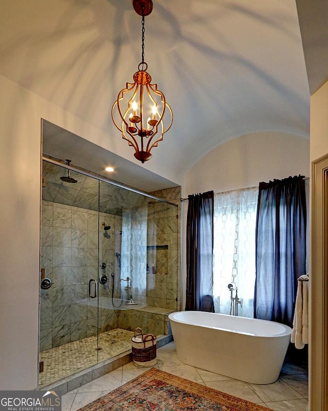 1178 Chambord Way NE, Brookhaven, GA 30319 - bathroom featuring a soaking tub, a stall shower, a chandelier, marble finish flooring, and lofted ceiling