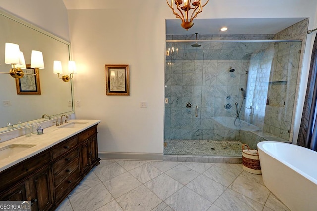 1178 Chambord Way NE, Brookhaven, GA 30319 - bathroom featuring a shower stall, a soaking tub, double vanity, and marble look tiles