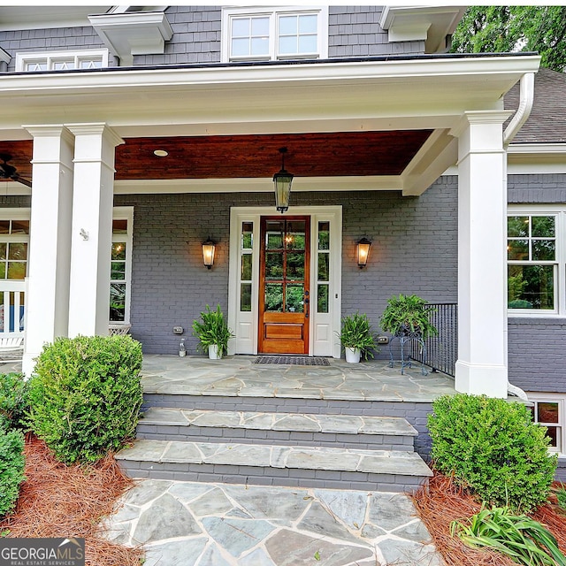 1178 Chambord Way NE, Brookhaven, GA 30319 - property entrance with a porch and brick siding