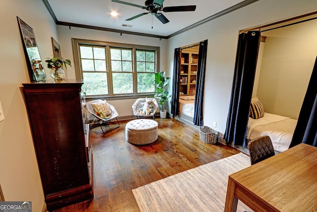 1178 Chambord Way NE, Brookhaven, GA 30319 - sitting room featuring wood finished floors, crown molding, ceiling fan, and baseboards