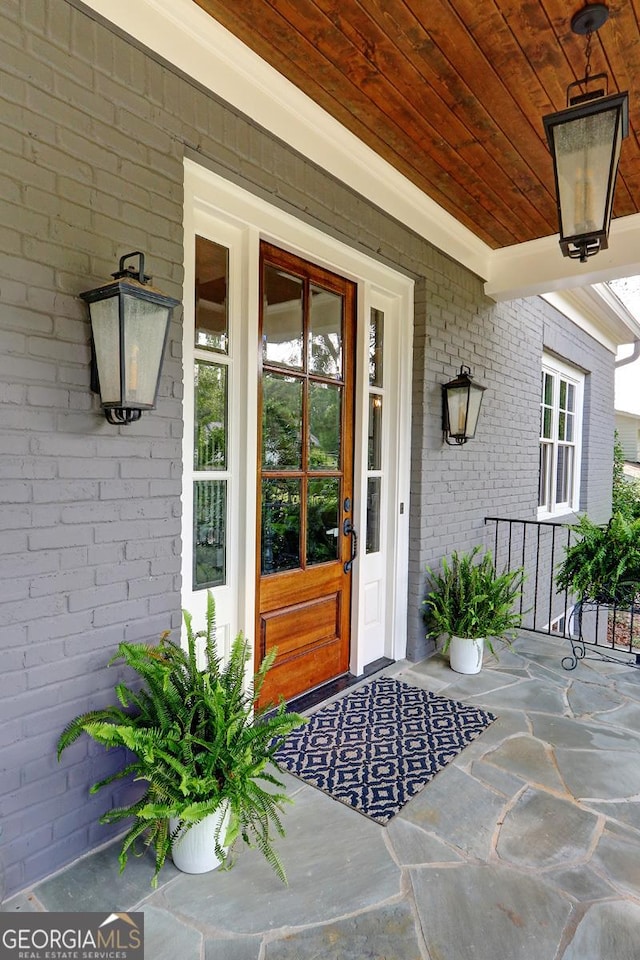 1178 Chambord Way NE, Brookhaven, GA 30319 - entrance to property with covered porch and brick siding