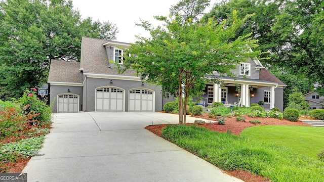 1178 Chambord Way NE, Brookhaven, GA 30319 - view of front of property with concrete driveway, a porch, roof with shingles, a front yard, and brick siding